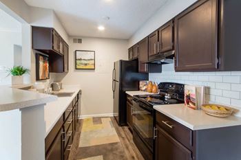 Well Equipped Kitchen at Deer Crest Apartments, Broomfield, Colorado